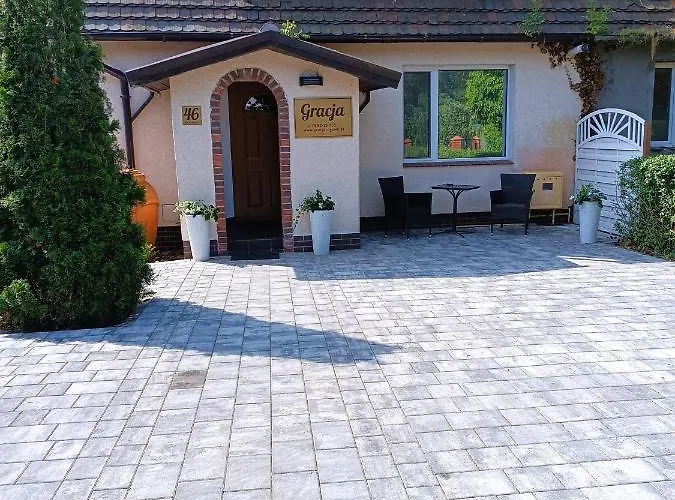 別荘 Gracja Dom Przy Plazy ロゴボ